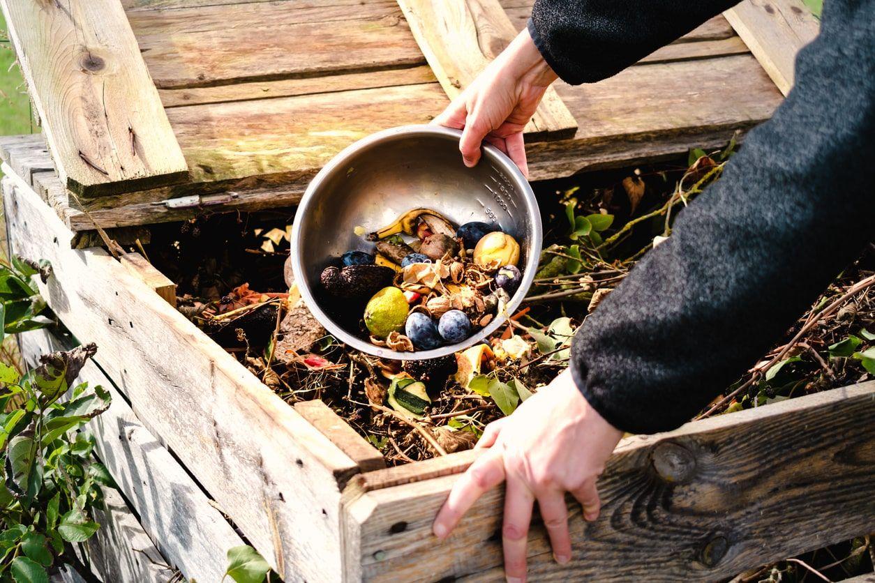 Person using a composter 