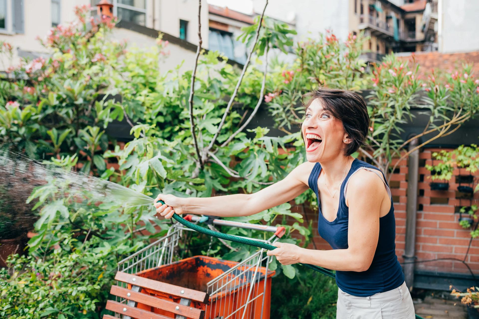 Woman Laughing With Plants