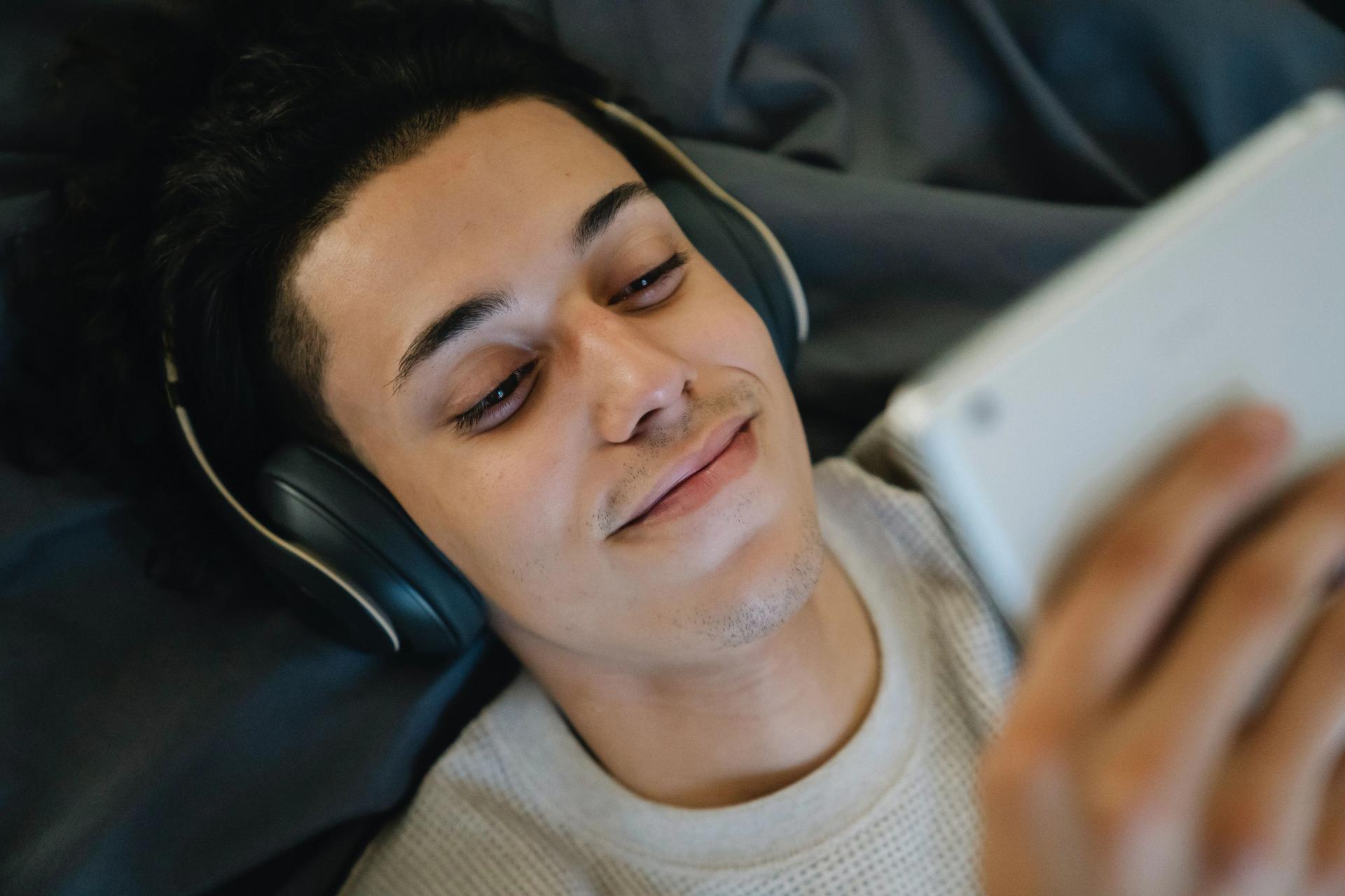 Comfortable in Bed with some Headphones