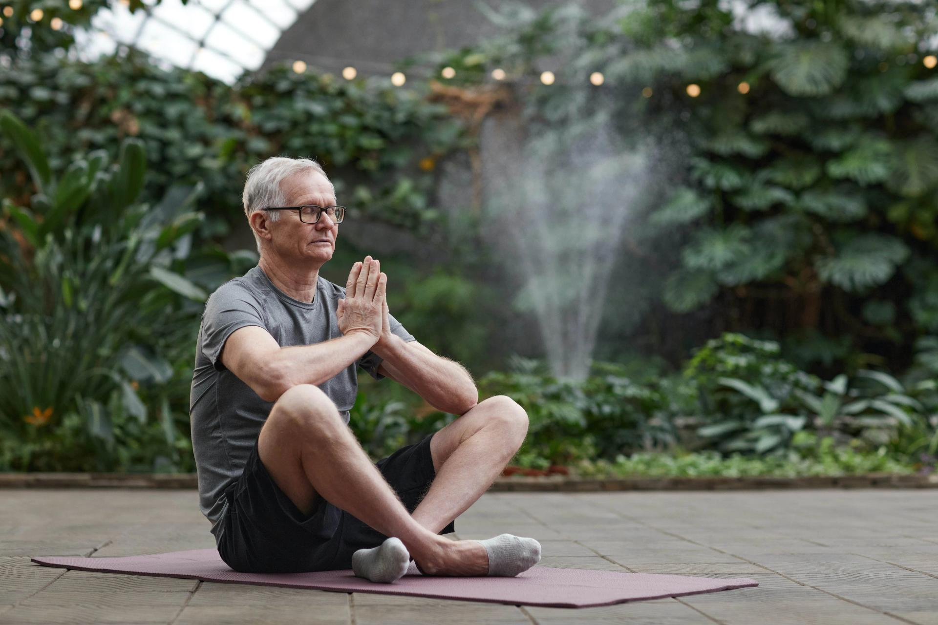 A Man Meditating in His Garden