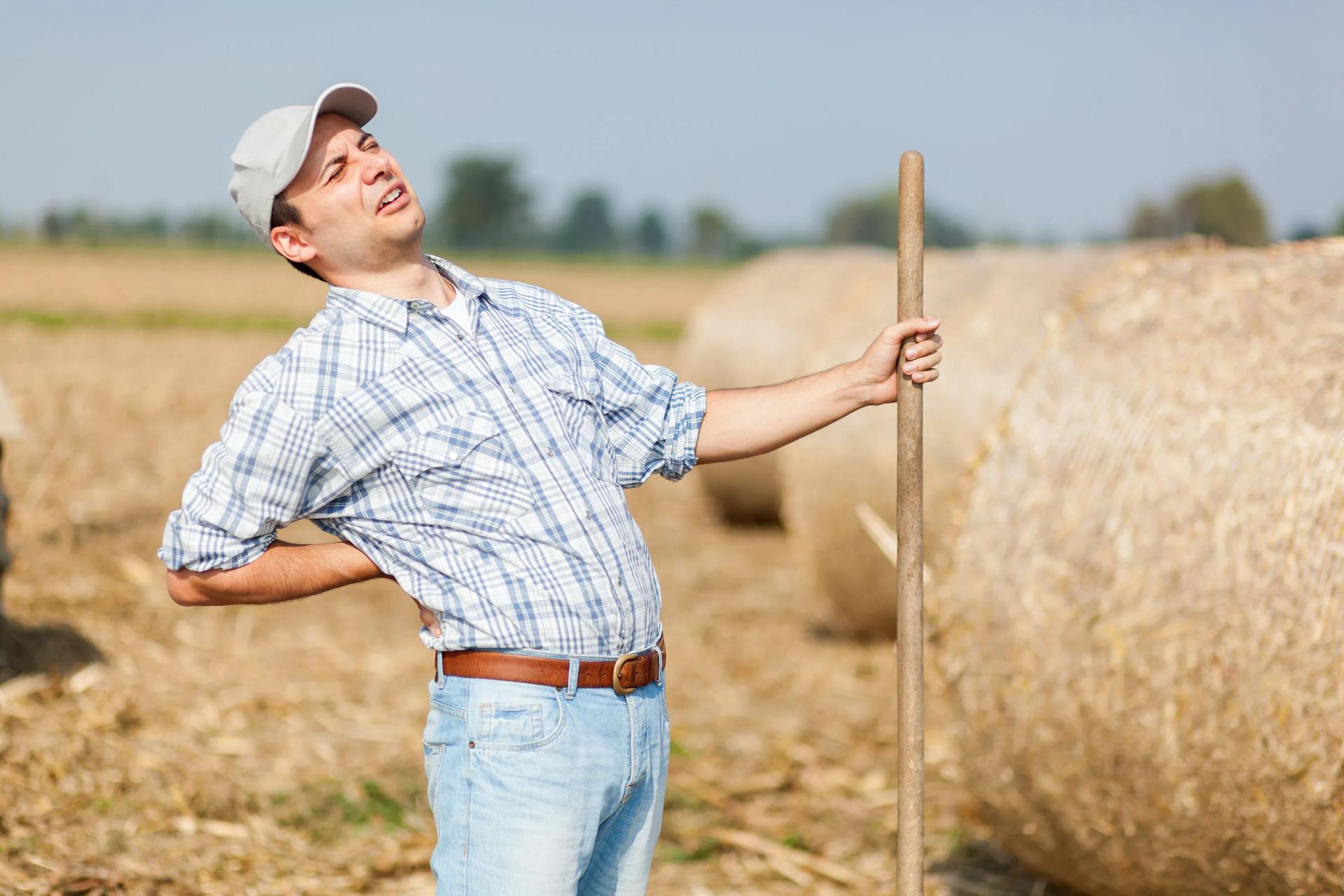 Tired Farmer On Tired Soil